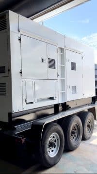 A Close Up View Of The Fresh Coat Of White Paint On The Commercial Generator That Was Refurbished.