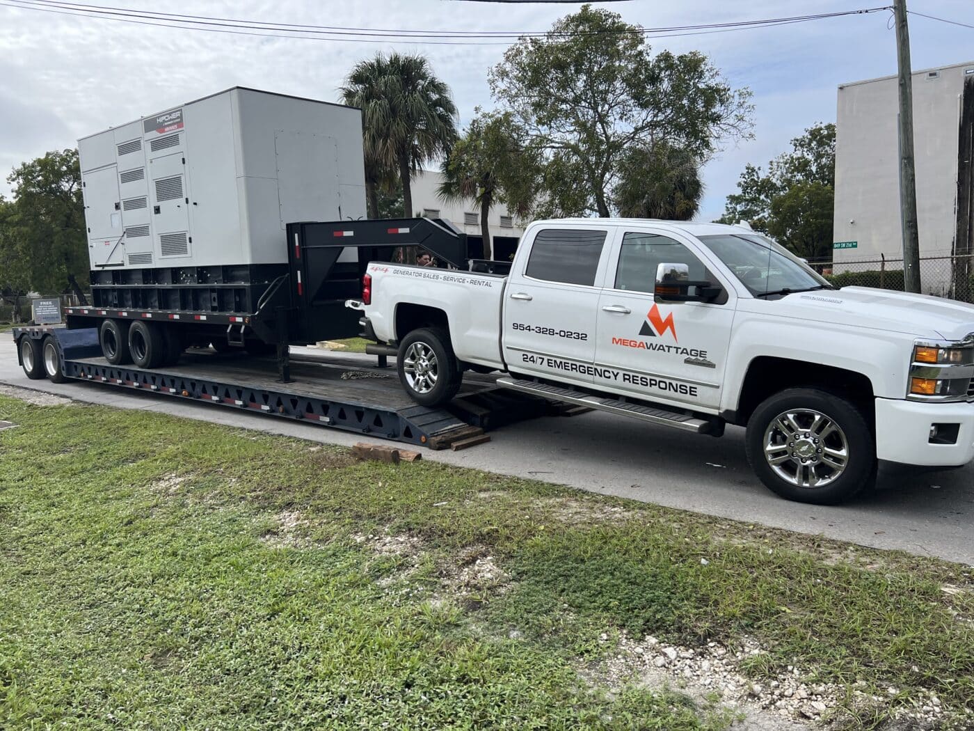 MegaWattage Truck Hauling Trailer-Mounted Diesel Generator.