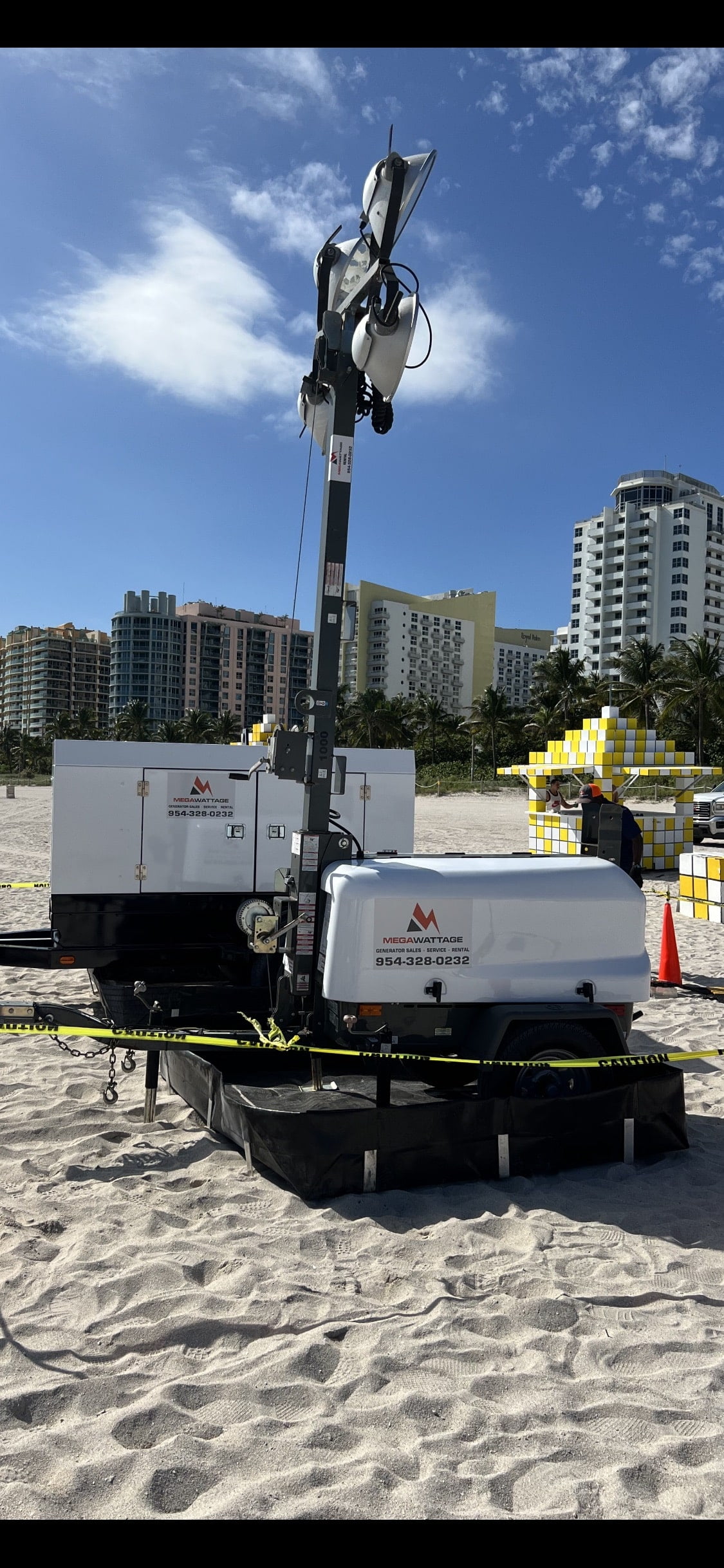 MegaWattage Portable Generator And Light Tower At Beach.